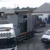 Waste compacter arriving at cardboard manufacturing factory Waste compacter arriving at cardboard manufacturing factory
